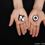 Main, non, noir